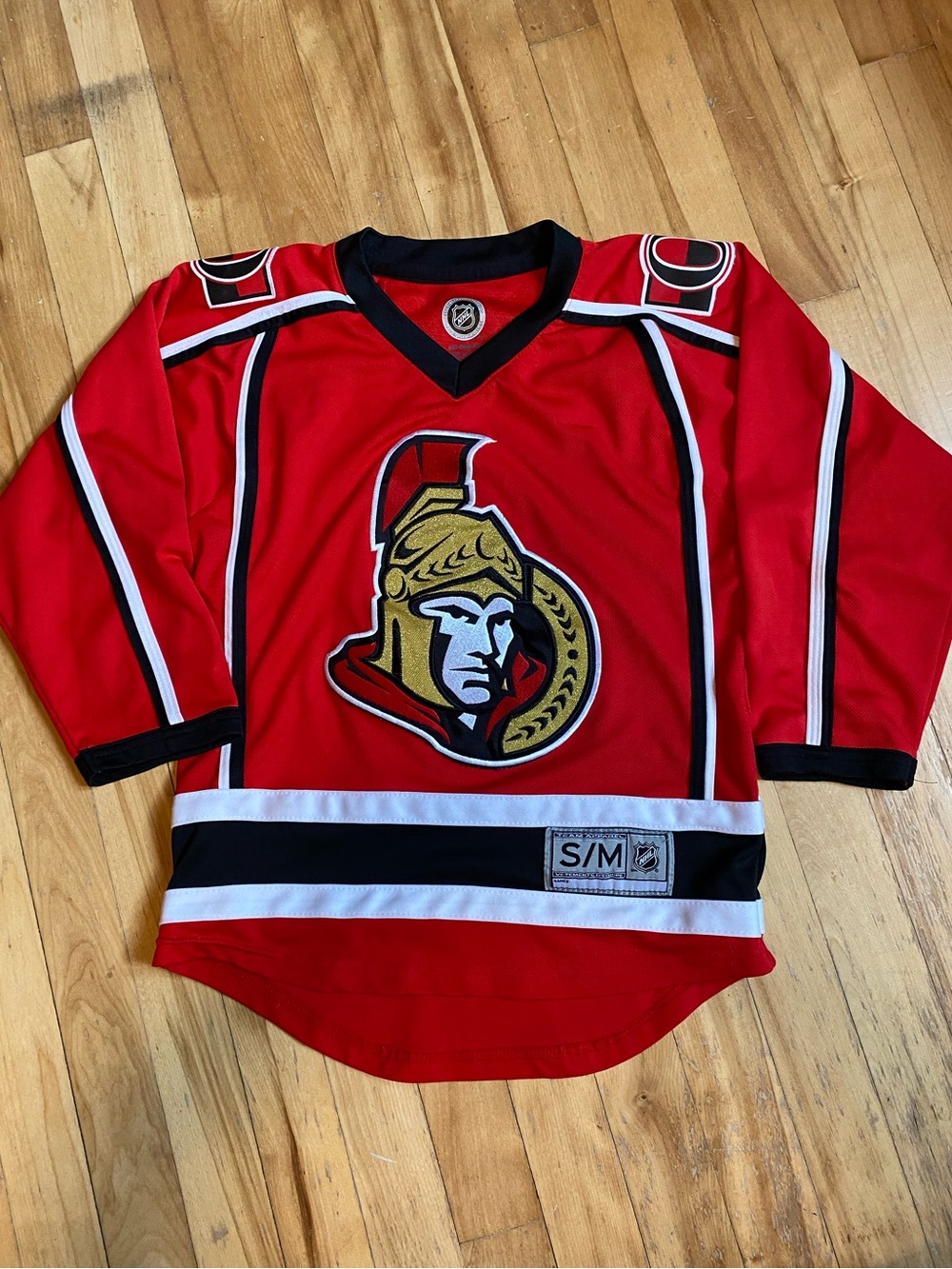 NHL Ottawa Senators Red and Black Hockey Jersey with Gold Crest Size S/M
